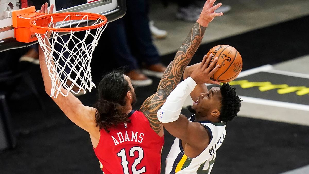 New Orleans Pelicans center Steven Adams (12) defends against Utah Jazz guard Donovan Mitchell...