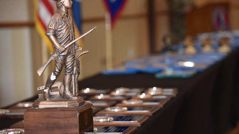 Awards line the tables before being presented to top performing Louisiana National Guard...