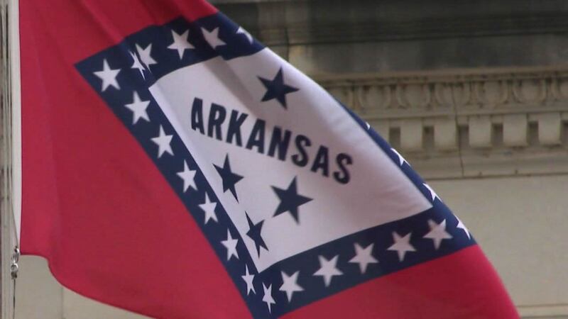 Arkansas state flag outside the state Capitol.