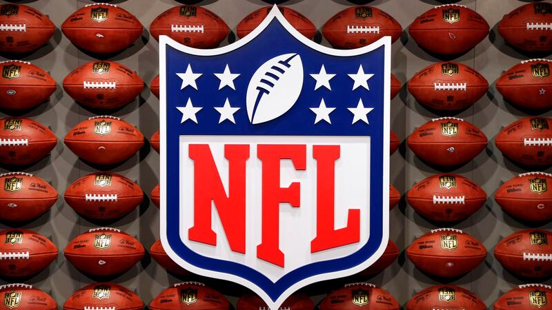 FILE - In this Nov. 30, 2017, file photo, an NFL logo is displayed at the opening of NFL...