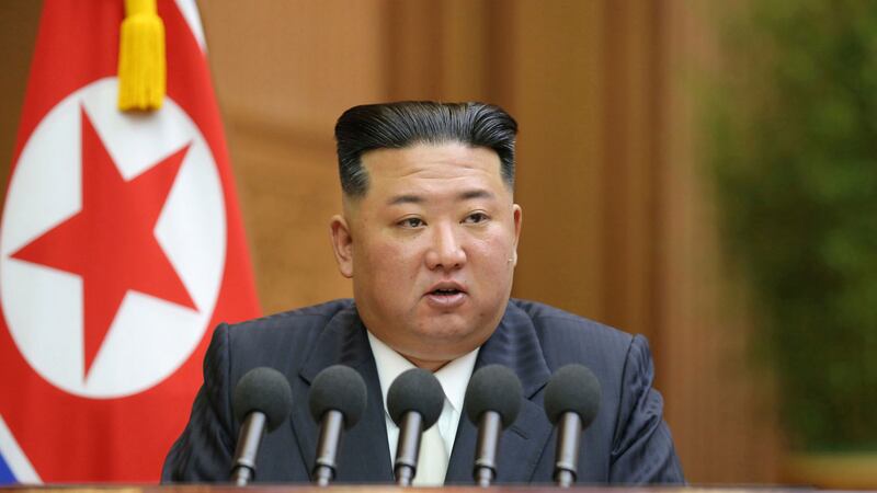 This photo provided by the North Korean government shows North Korean leader Kim Jong Un...