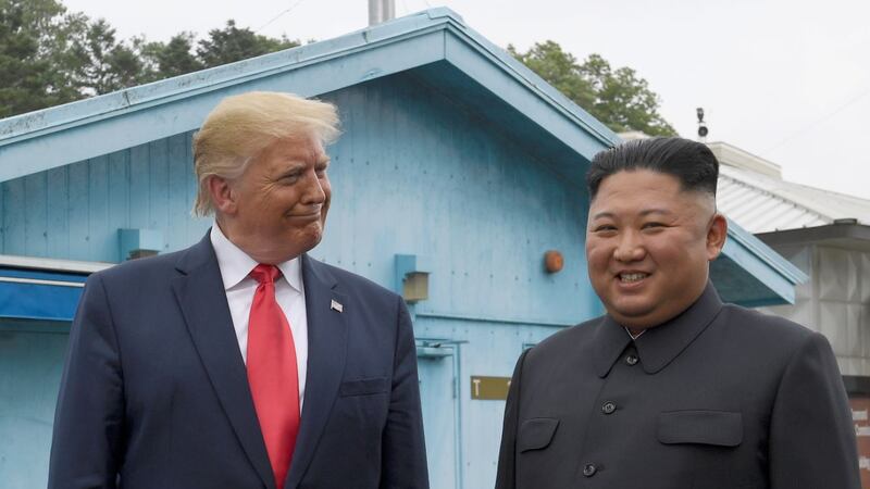 President Donald Trump meets with North Korean leader Kim Jong Un at the border village of...