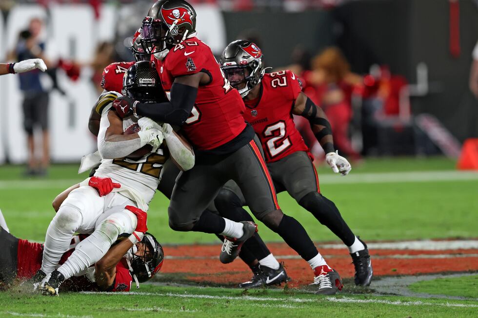 New Orleans Saints running back Mark Ingram II (22) is stopped by Tampa Bay Buccaneers...