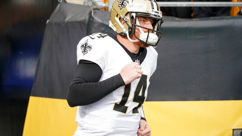 New Orleans Saints quarterback Andy Dalton (14) takes the field against the Pittsburgh...