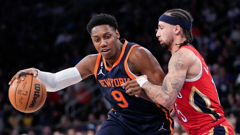 New York Knicks guard RJ Barrett (9) drives to the basket against New York Knicks guard...