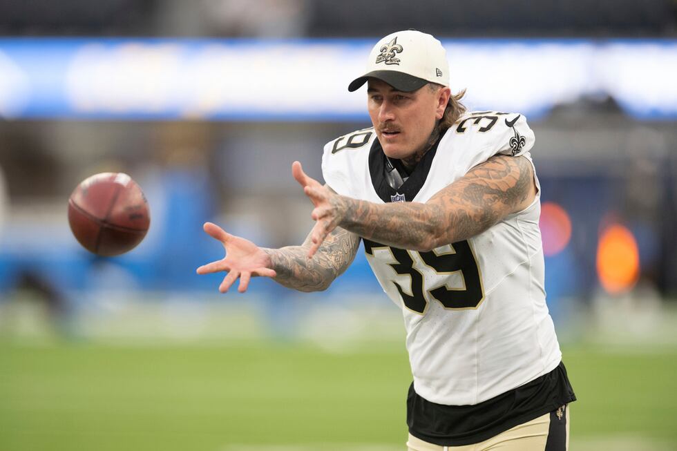 New Orleans Saints punter Lou Hedley (39) warms up before an NFL preseason football game...