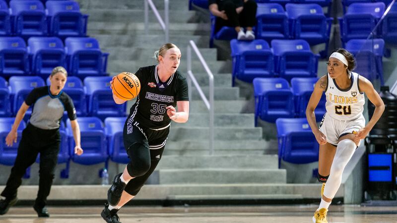 Sharna Ayres (left) dribbles down court after a rebound against Texas A&M-Commerce.