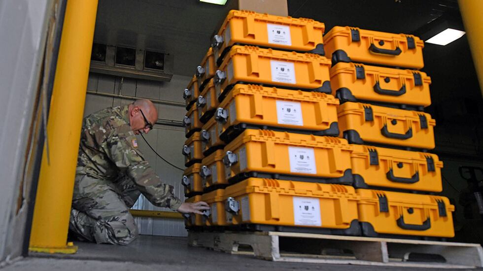 Louisiana National Guardsmen with the 139th Regional Support group package and ship ventilator...