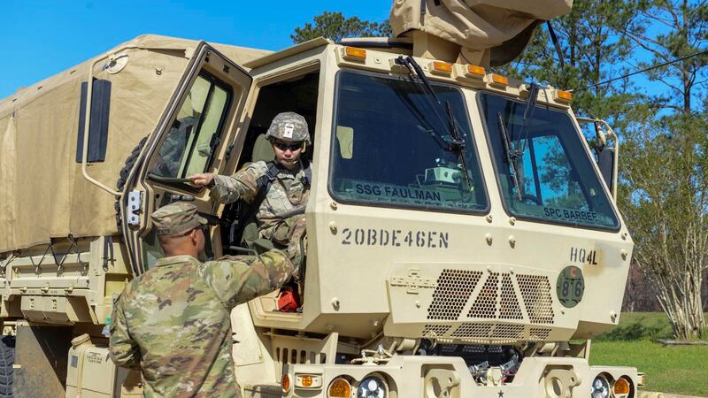 Soldiers with the Louisiana National Guard's 3rd Battalion, 156th Infantry Regiment, and...