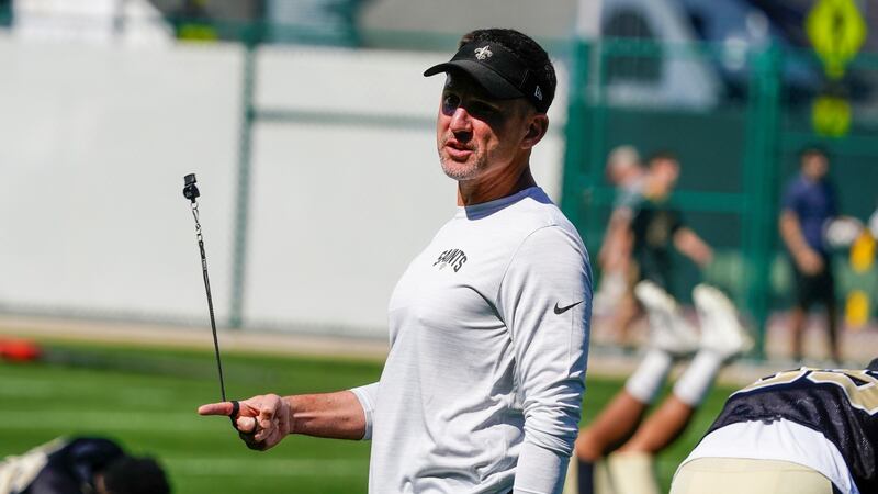 New Orleans Saints' head coach Dennis Allen watches a drill before an NFL football joint...