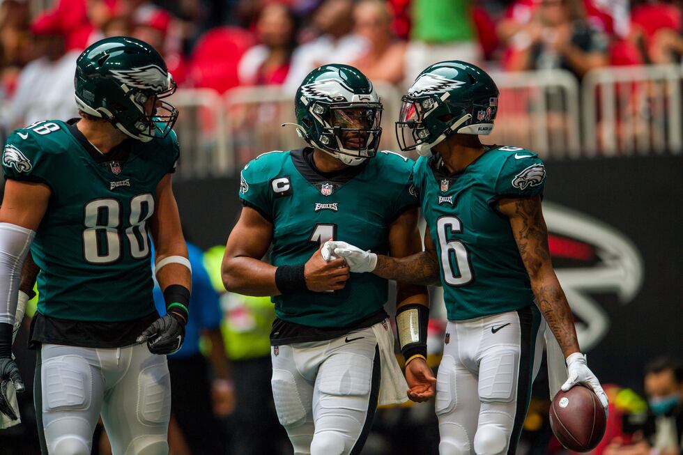 Philadelphia Eagles wide receiver DeVonta Smith (6), quarterback Jalen Hurts (1), and tight...