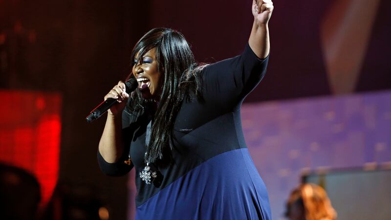 FILE - Mandisa performs during the Dove Awards Tuesday, Oct. 7, 2014, in Nashville, Tenn.