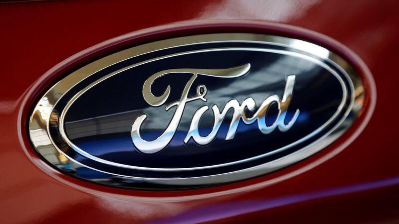 This Feb. 15, 2018, photo shows a Ford logo on a 2018 Expedition 4x4 on display at the...