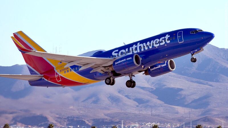 FILE - A Southwest Airlines pilot is suing the company after a former colleague pled guilty...