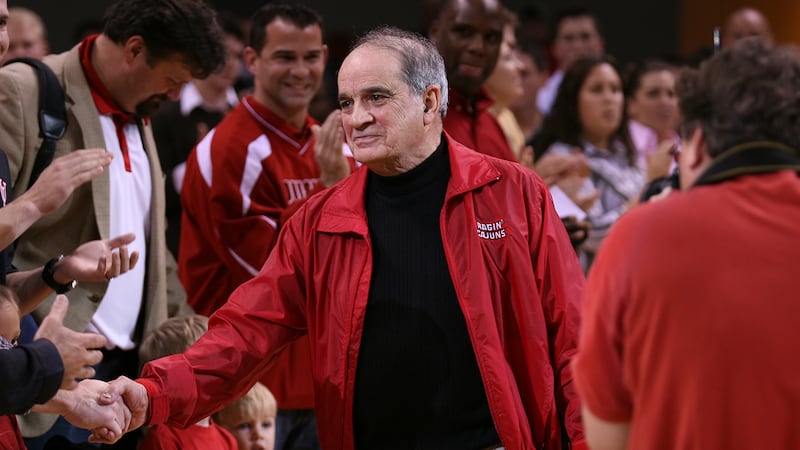 Dr. Ray P. Authement greets fans at a Ragin' Cajuns athletics event prior to his retirement as...