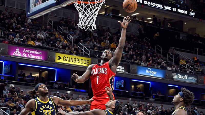 New Orleans Pelicans forward Zion Williamson (1) shoots over the Indiana Pacers defense during...