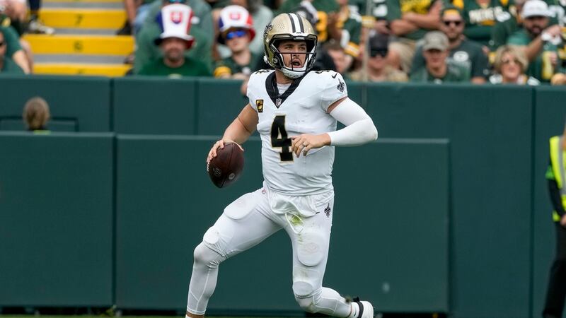 New Orleans Saints' Derek Carr runs during the first half of an NFL football game against the...