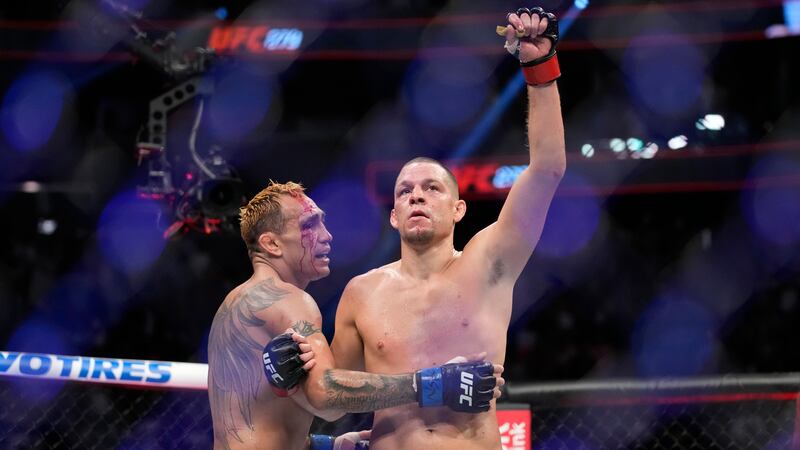 UFC star Nate Diaz, right, is wanted for arrest by New Orleans police after allegedly...
