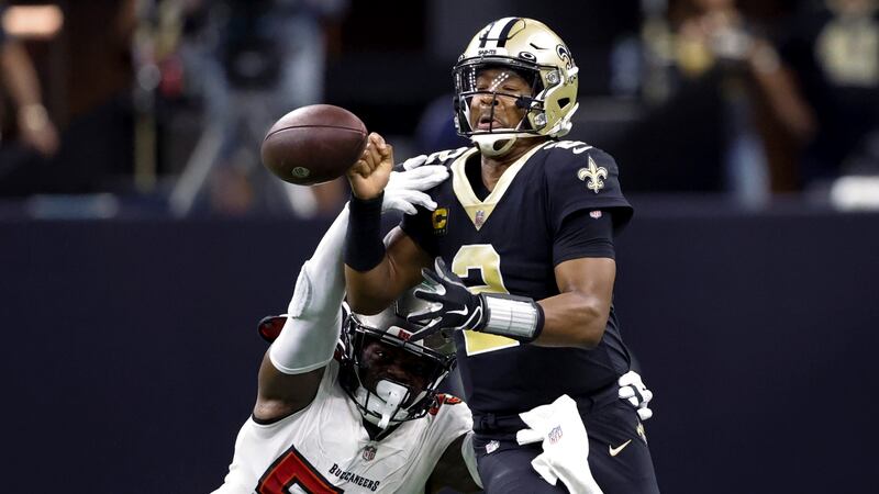 Tampa Bay Buccaneers linebacker Shaquil Barrett strips the ball form New Orleans Saints...
