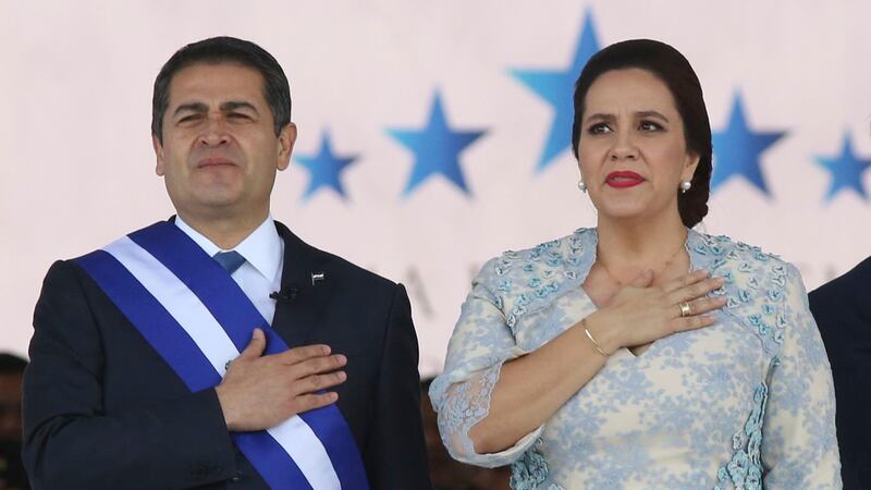 FILE - In this Jan. 27, 2018 file photo, Honduran President Juan Orlando Hernandez, left,...