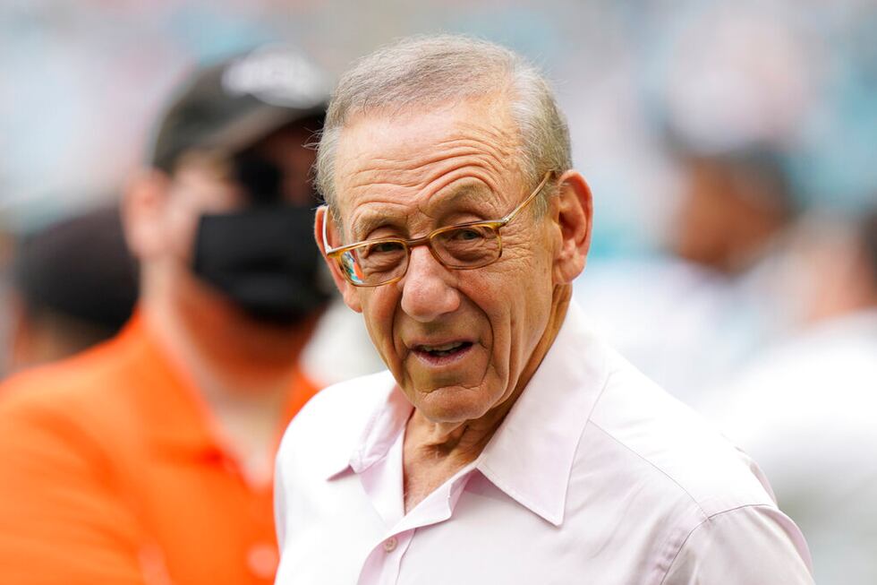 FILE - Miami Dolphins owner Stephen Ross gestures at the end of an NFL football game against...