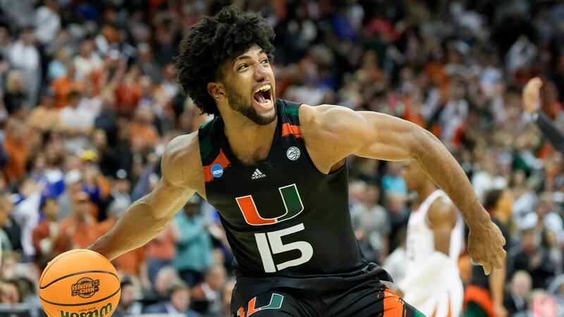 Miami forward Norchad Omier celebrates after their win against Texas in an Elite 8 college...