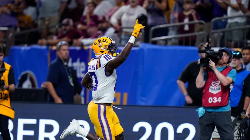 LSU wide receiver Jaray Jenkins (10) celebrates a touchdown reception in the second half of an...